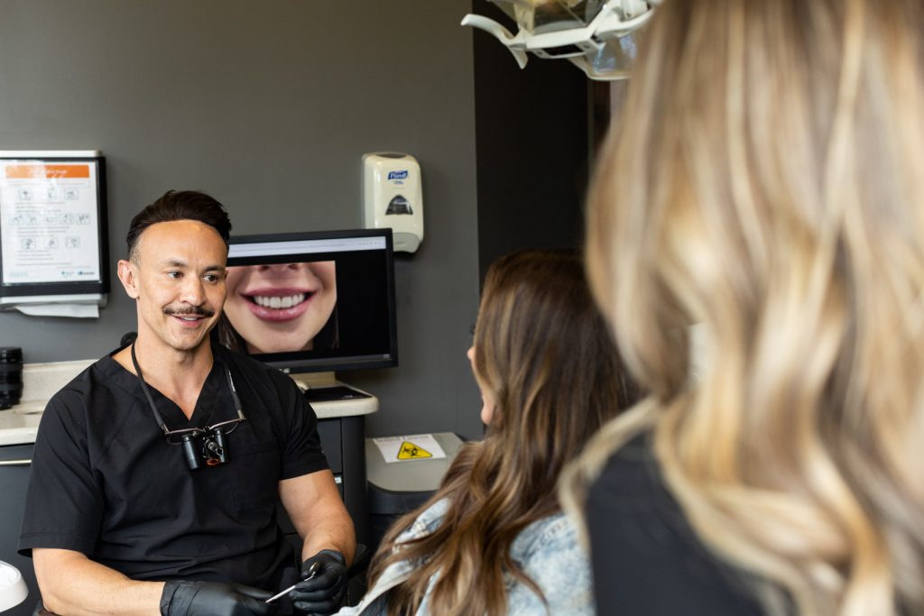Dr. Jeff Wakeford with Patient | Wentworth Family Dental | General & Family Dentist | SW Calgary